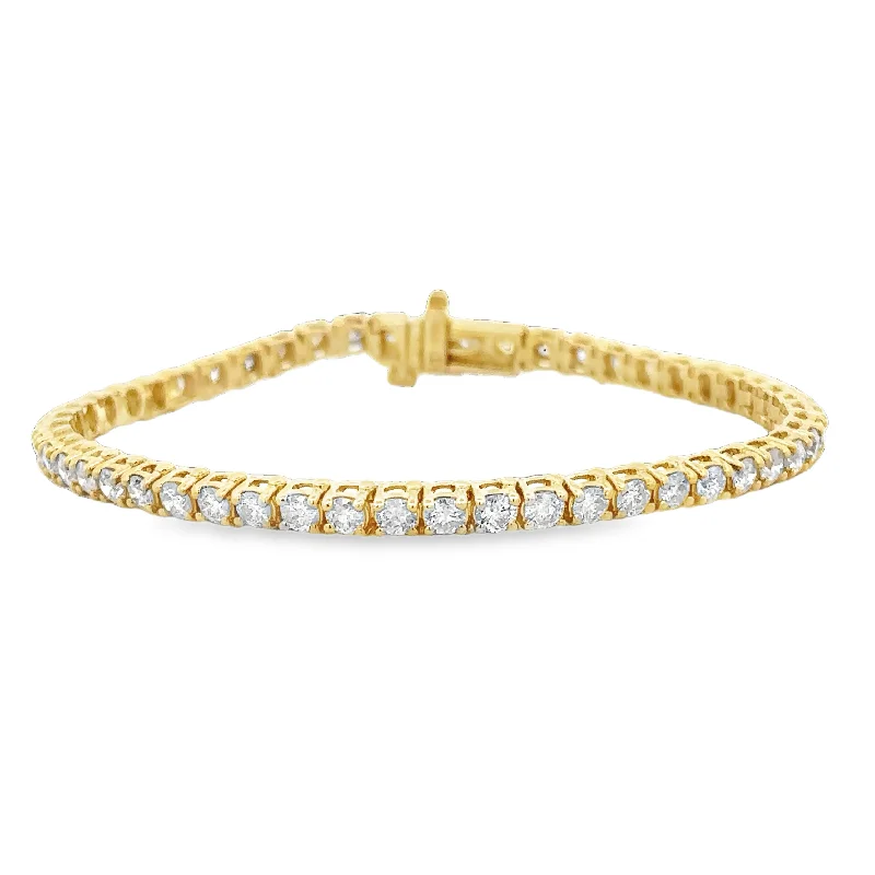 Dainty And Elegant Jewelry Now At Reduced Prices 5.0 CTW Diamond Tennis Bracelet in Yellow Gold Dainty And Elegant Jewelry Now At Reduced Prices 5.0 CTW Diamond Tennis Bracelet in Yellow Gold