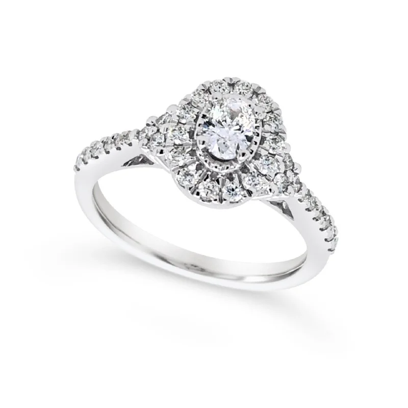 Eco-Friendly Sustainable Jewelry For Conscious Buyers Oval Diamond and Halo Tapered Detail Engagement Ring Eco-Friendly Sustainable Jewelry For Conscious Buyers Oval Diamond and Halo Tapered Detail Engagement Ring