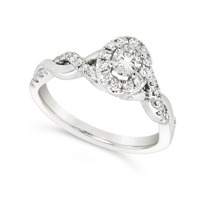 Get The Best Deals On Timeless Jewelry Pieces Oval Diamond Halo and Crossover Design Engagement Ring Get The Best Deals On Timeless Jewelry Pieces Oval Diamond Halo and Crossover Design Engagement Ring