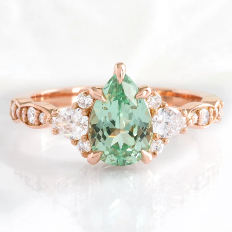 Breathtaking Jewelry At Limited-Time Savings 2.2 Ct. Pear Green Sapphire Ring in Dahlia 3 Stone Diamond Band Breathtaking Jewelry At Limited-Time Savings 2.2 Ct. Pear Green Sapphire Ring in Dahlia 3 Stone Diamond Band