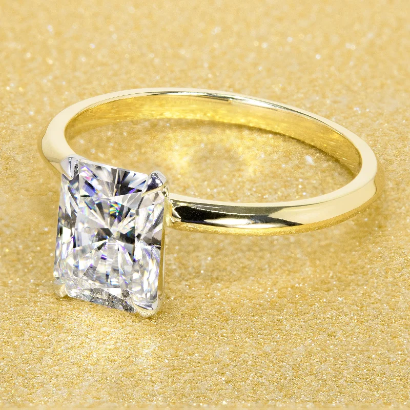 Shop Dazzling Jewelry At The Best Prices The Lexi, 1.75ct Radiant-cut Classic Knife-Edge Solitaire Ring Shop Dazzling Jewelry At The Best Prices The Lexi, 1.75ct Radiant-cut Classic Knife-Edge Solitaire Ring