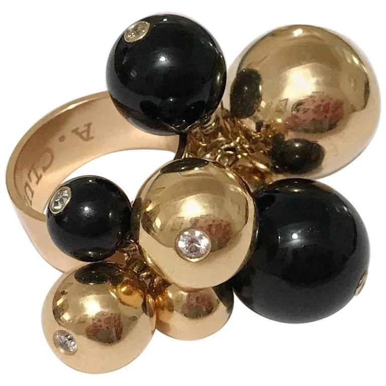 Trending Jewelry Now Available At Exclusive Prices 18kt Yellow Gold and Onyx Tassel Ring with Diamonds Trending Jewelry Now Available At Exclusive Prices 18kt Yellow Gold and Onyx Tassel Ring with Diamonds