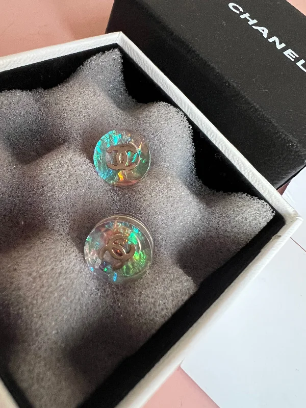 High-End Sparkle, Low-End Prices – Shop Now Chanel Pearlescent Resin Stud Earrings with CC Detail High-End Sparkle, Low-End Prices – Shop Now Chanel Pearlescent Resin Stud Earrings with CC Detail