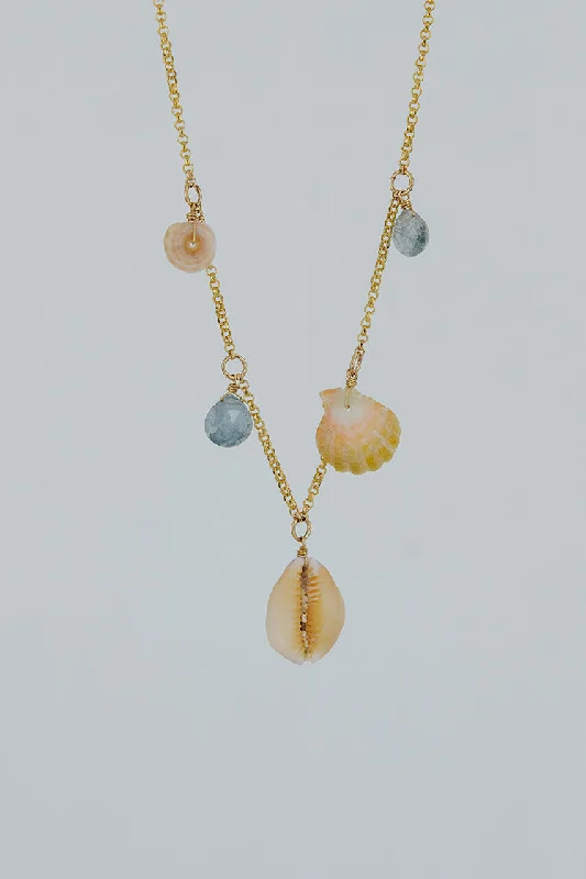 Special Deals On Handcrafted And Designer Jewelry Shell Pile Necklace - Purple Top Cowrie Shell + Aquamarine Special Deals On Handcrafted And Designer Jewelry Shell Pile Necklace - Purple Top Cowrie Shell + Aquamarine