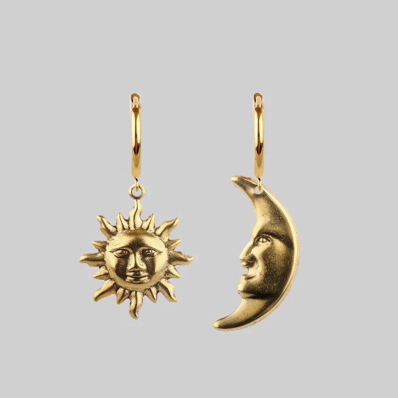 The Jewelry Sale You've Been Waiting For Is Here DAY TO NIGHT. Sun & Moon Hoop Earrings - Gold The Jewelry Sale You've Been Waiting For Is Here DAY TO NIGHT. Sun & Moon Hoop Earrings - Gold