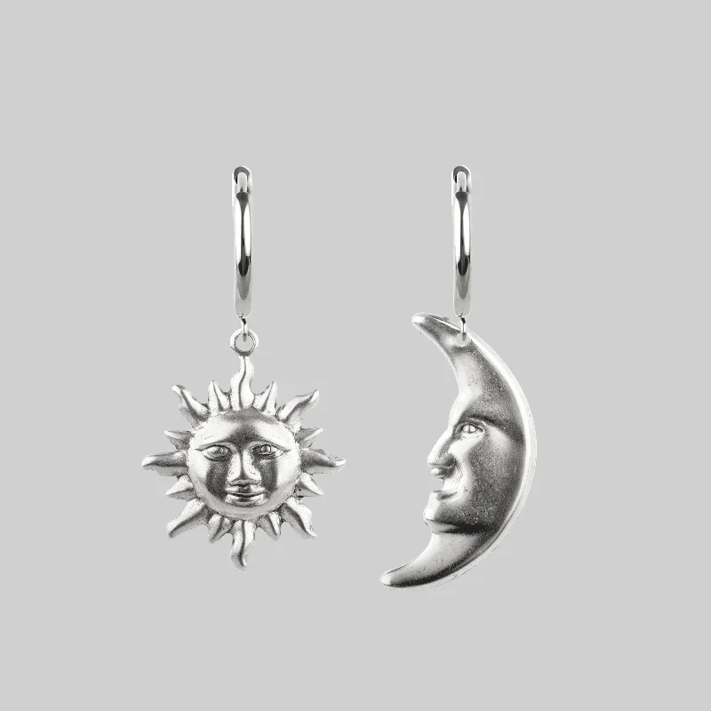 Affordable Glamour – Must-Have Jewelry At Special Rates DAY TO NIGHT. Sun & Moon Hoop Earrings - Silver Affordable Glamour – Must-Have Jewelry At Special Rates DAY TO NIGHT. Sun & Moon Hoop Earrings - Silver
