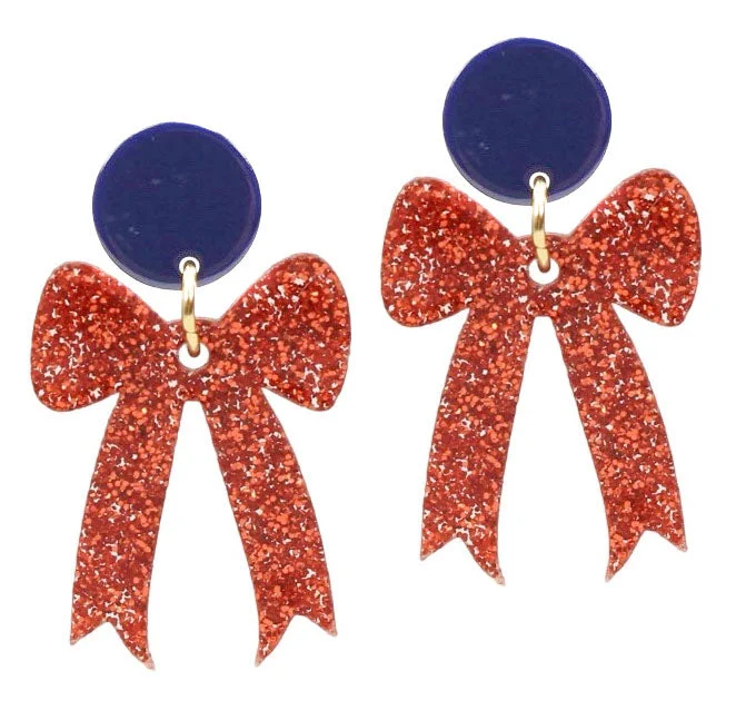 Affordable Glamour – Premium Jewelry For Less Gameday Bow Earring - Orange Glitter