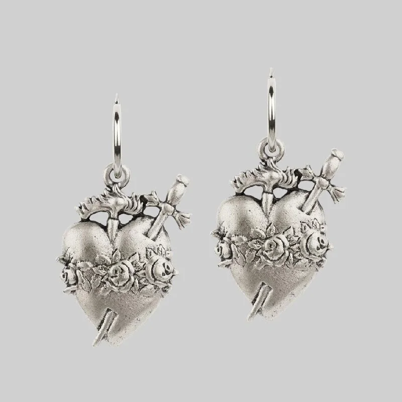 Limited-Stock Jewelry Sale – Shop Before It's Gone INFERNO. Sacred Heart Hoop Earrings - Silver Limited-Stock Jewelry Sale – Shop Before It's Gone INFERNO. Sacred Heart Hoop Earrings - Silver