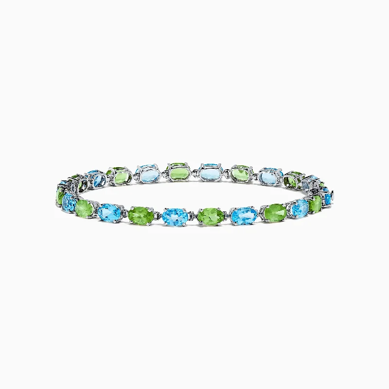 Shop Stylish Jewelry Now And Save Big 14K White Gold Blue Topaz and Peridot Tennis Bracelet, 13.80 TCW Shop Stylish Jewelry Now And Save Big 14K White Gold Blue Topaz and Peridot Tennis Bracelet, 13.80 TCW